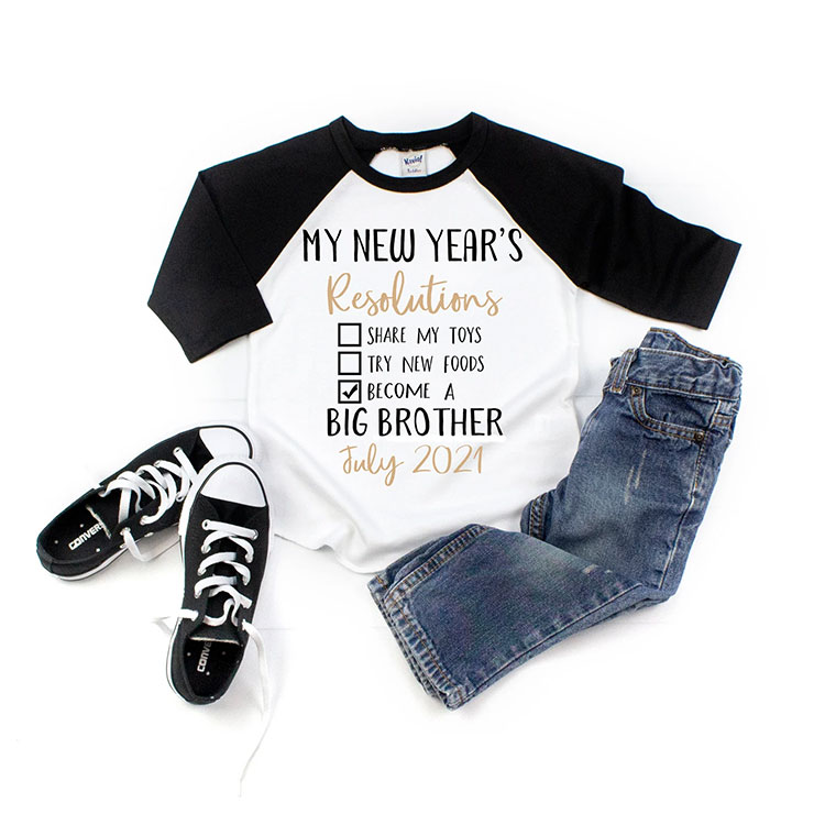 toddler raglan t-shirt saying "My new year's resolutions: share my toys, try new foods, become a big brother"