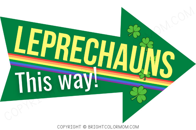 a large green arrow featuring a rainbow stripe and shamrocks with the text "Leprechauns this way!"