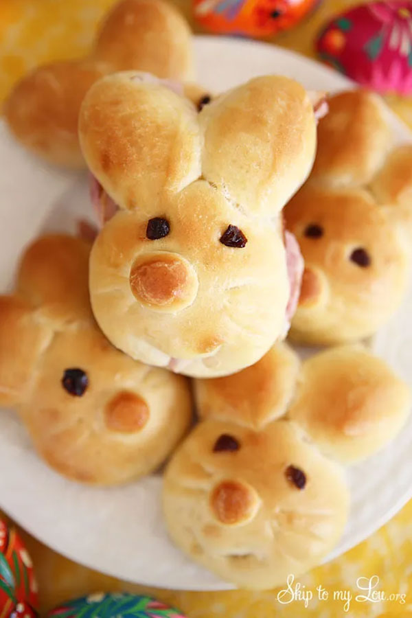 a stack of bread rolls made to look like bunny heads
