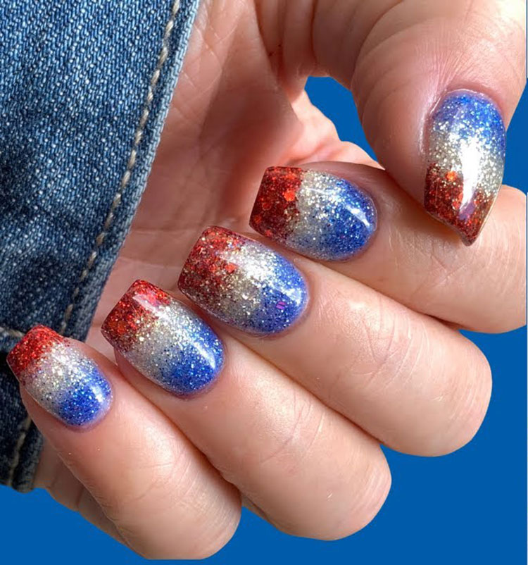 dip nails done in red, silver, and blue powders to resemble a bomb pop