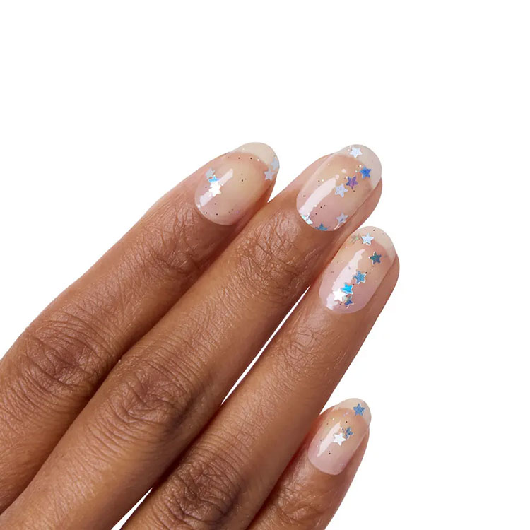 nails featuring the Color Street Wishing Stars wrap design