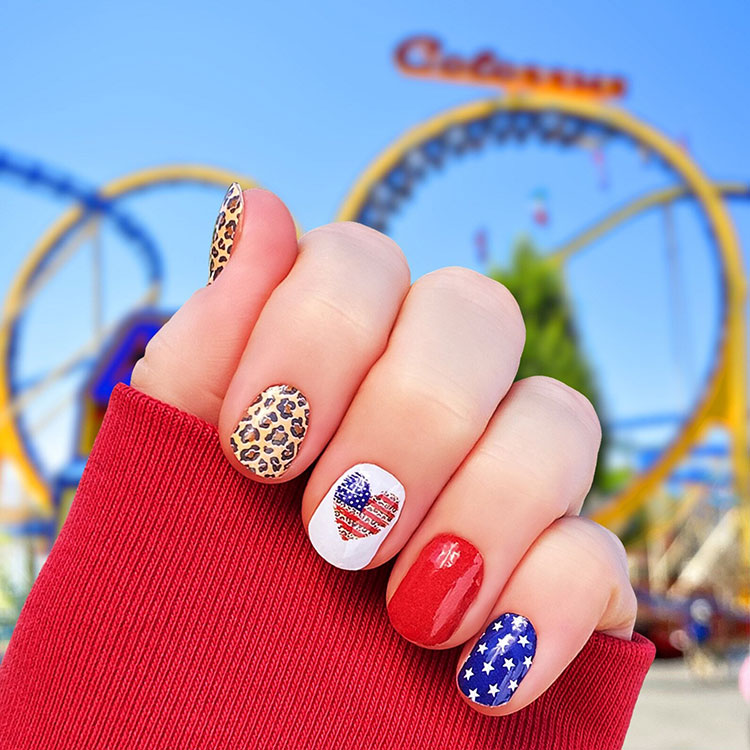 nail wrap designs in a set including leopard print, white with an American flag heart, plain red, and blue with white dots