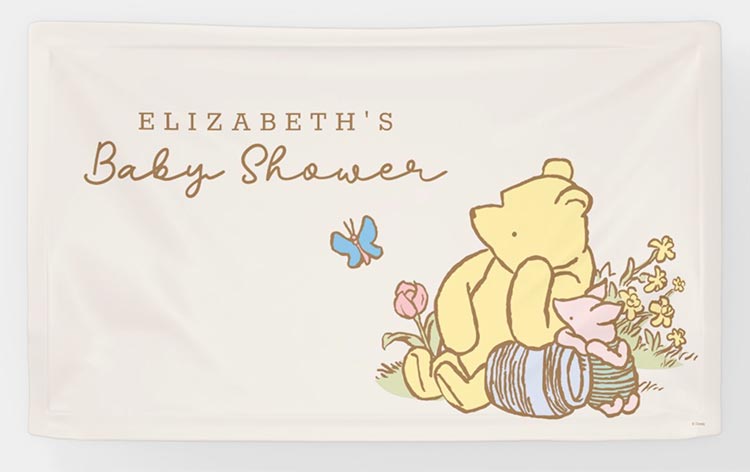 a large custom baby shower banner featuring the classic Pooh and Piglet