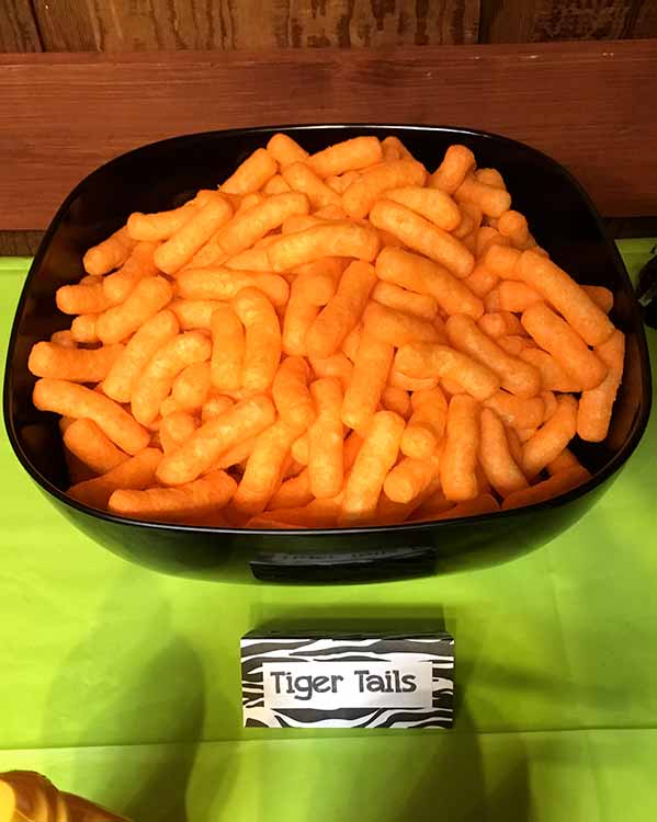 Cheeto Puffs in a bowl labeled as "Tiger Tails"