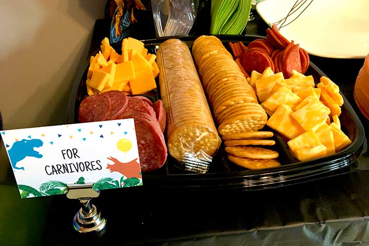 a meat, cheese, and cracker platter labeled "For Carnivores"