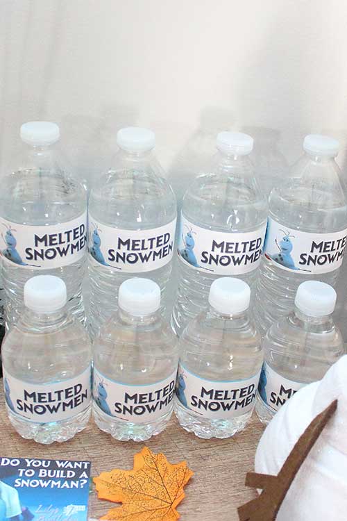 bottles of water labeled "Melted Snowmen" with a picture of Olaf melting