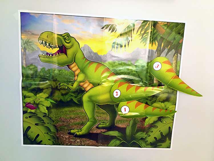 a pin the tail on the T-rex game