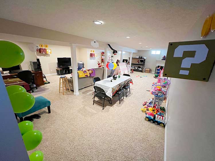 residential basement decorated for a Mario birthday party