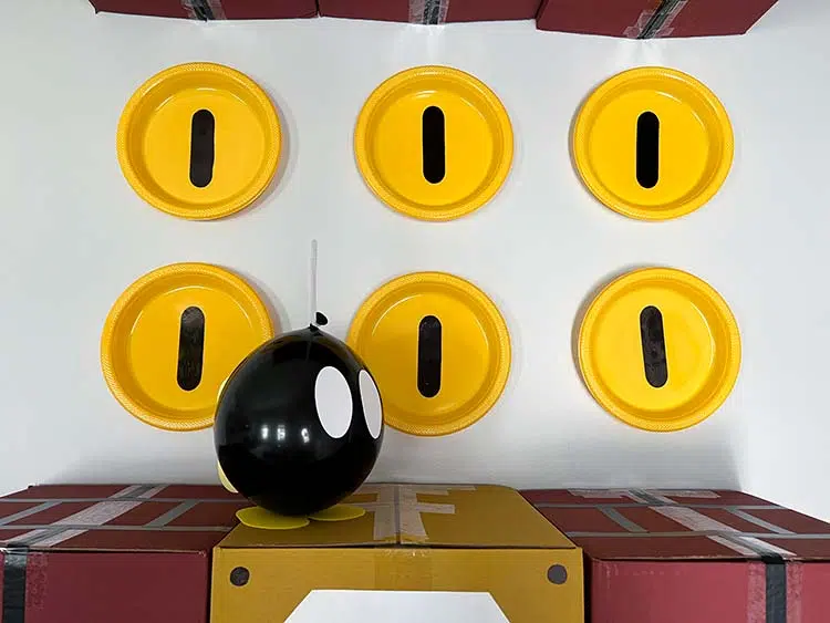 homemade gold coins behind a DIY Bob-omb