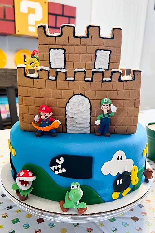 front of a DIY Mario cake