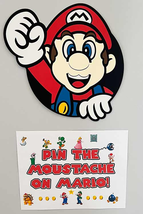 "Pin the Mustache on Mario" party game