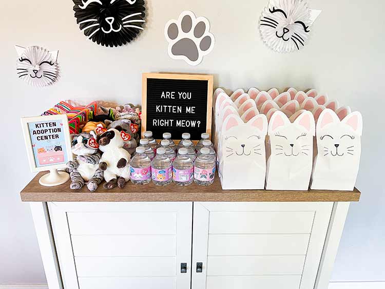 many cat-themed party favors