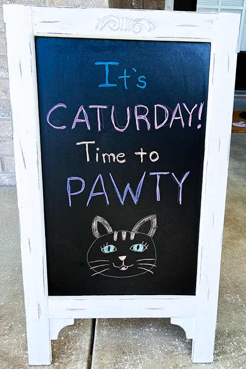 a chalkboard greeting sign