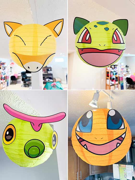 various Pokemon creatures made from paper lanterns