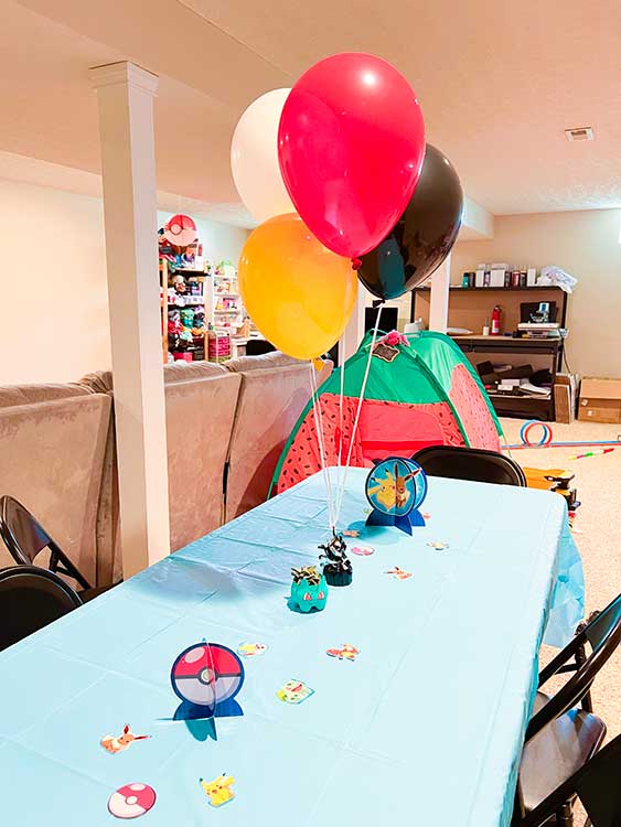 a table decorated for a Pokemon birthday party