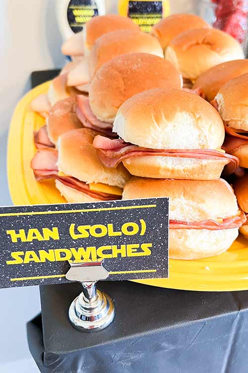 platter of ham sandwiches