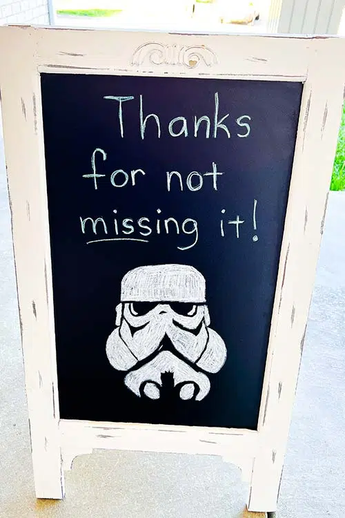 a thank-you chalkboard sign