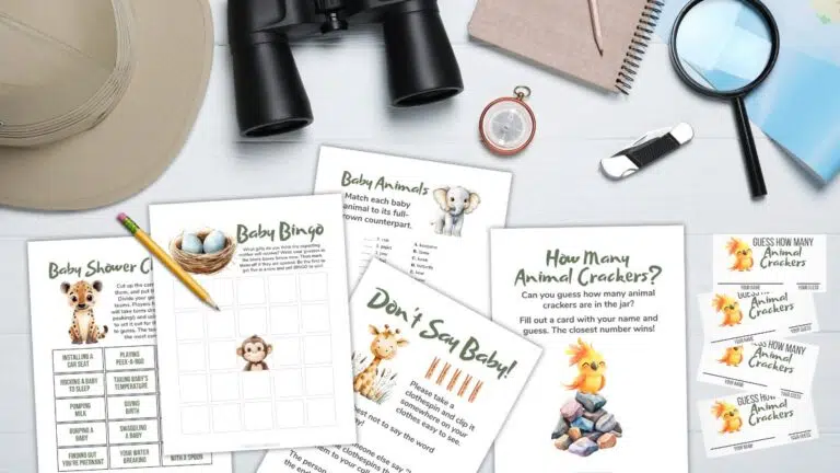 safari-themed baby shower games scattered on an explorer's desk