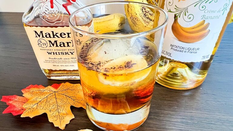 an old-fashioned in front of Maker's Mark and banana liqueur