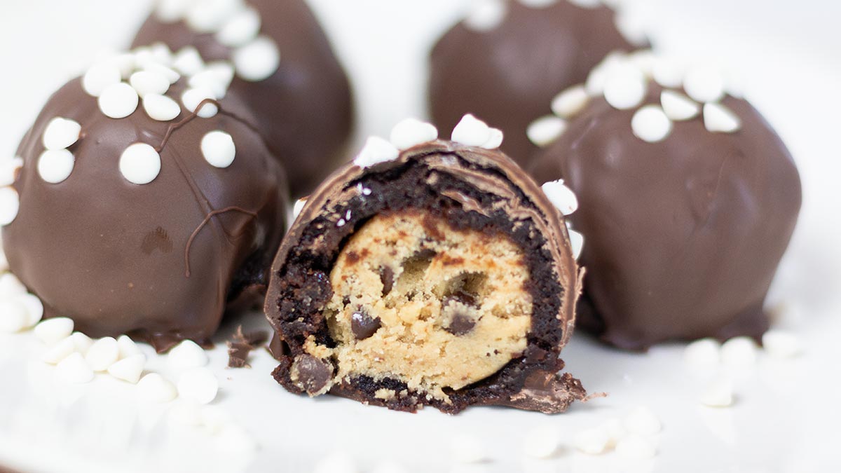 plate of chocolate chip cookie dough brownie bombs