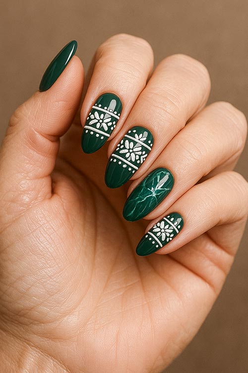 medium almond Christmas nails with dark green polish