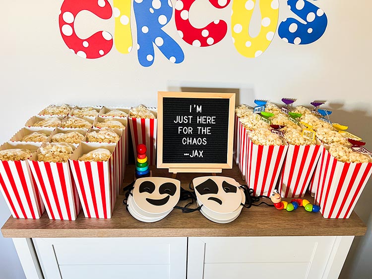 cabinet full of Amazing Digital Circus themed party favors and decor