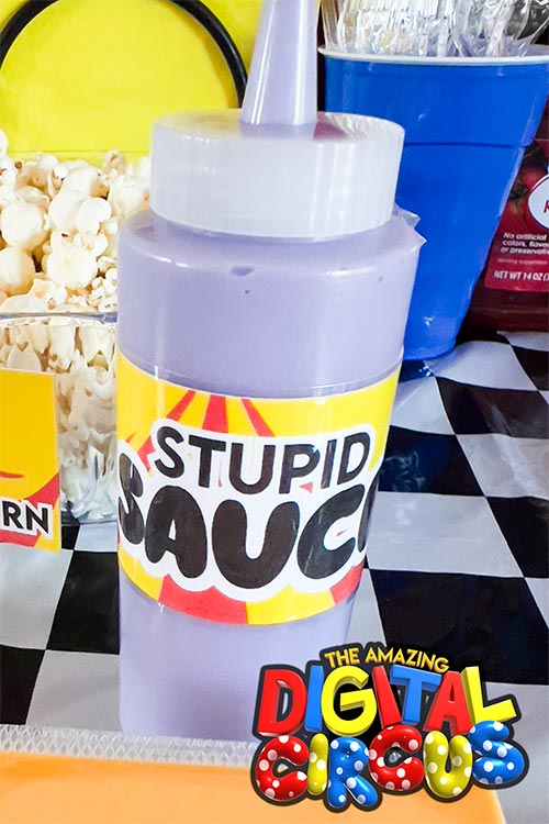 squirt bottle of purple condiment labeled Stupid Sauce