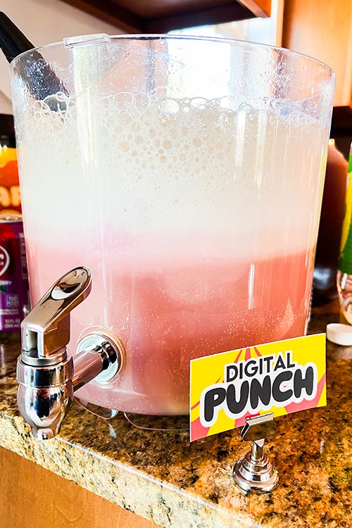 drink dispenser full of sherbet punch labeled Digital Punch