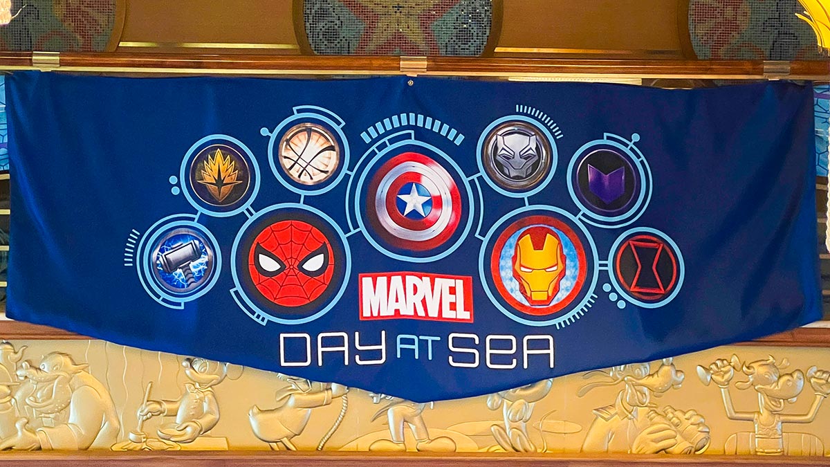Marvel Day at Sea banner with superhero logos and icons