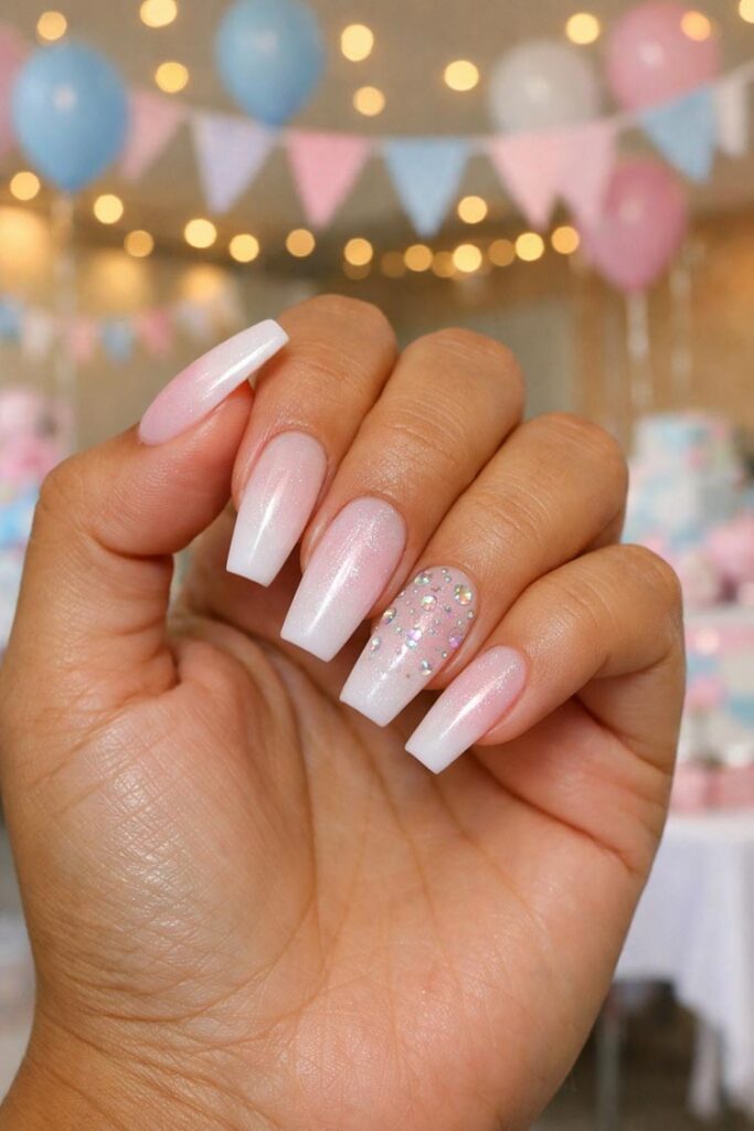 Pink ombre nails with rhinestone accent on coffin nails