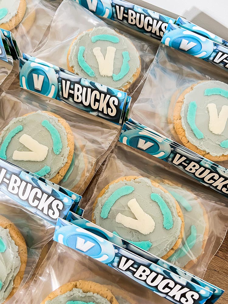 DIY Fortnite V-Bucks cookies individually packaged as party favors