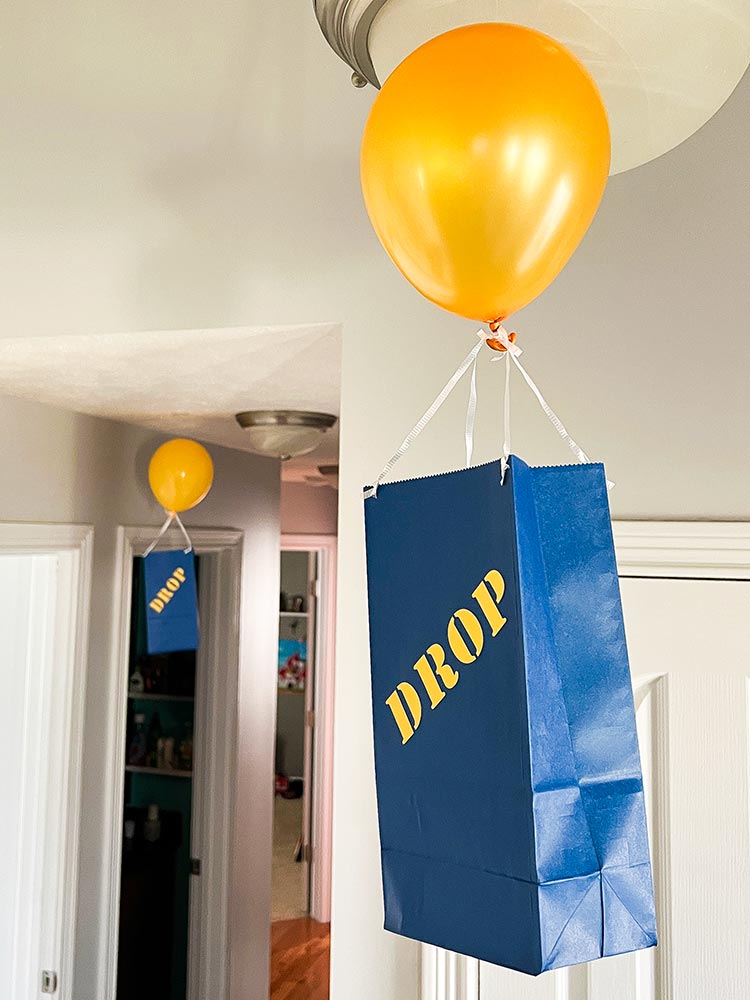 Fortnite drop box decorations hanging from ceiling with balloons