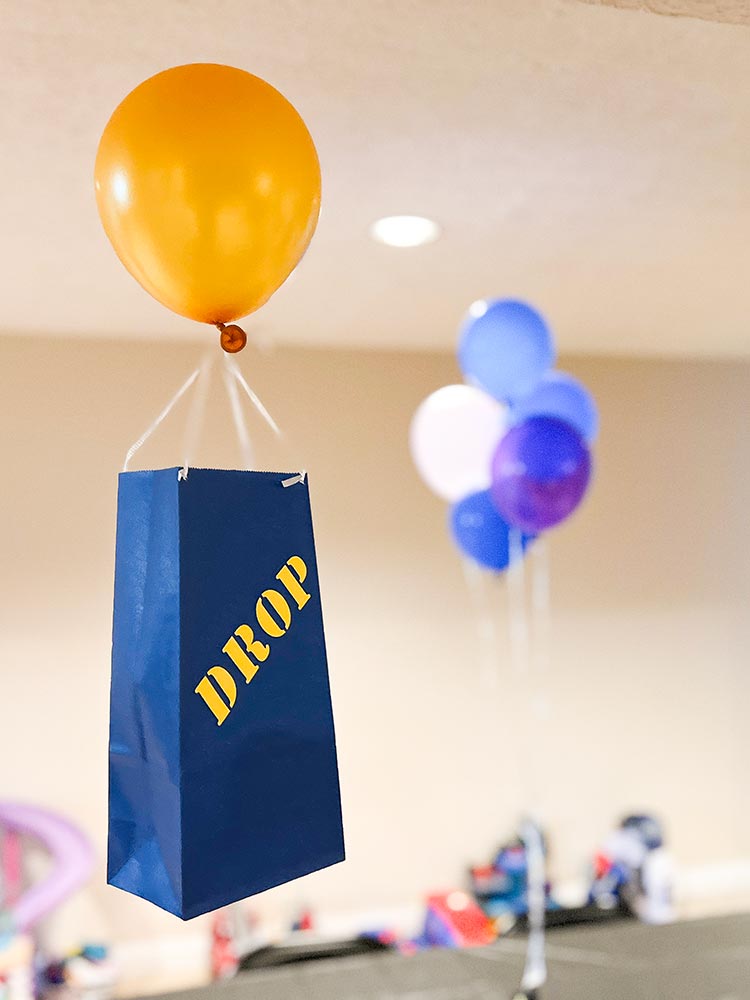 Fortnite-themed drop decoration with yellow balloon and blue bag
