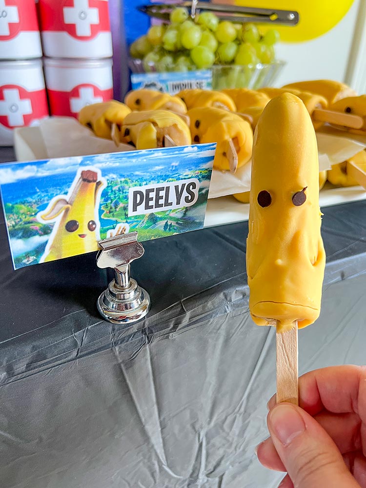Fortnite Peely chocolate-covered banana popsicles at birthday party
